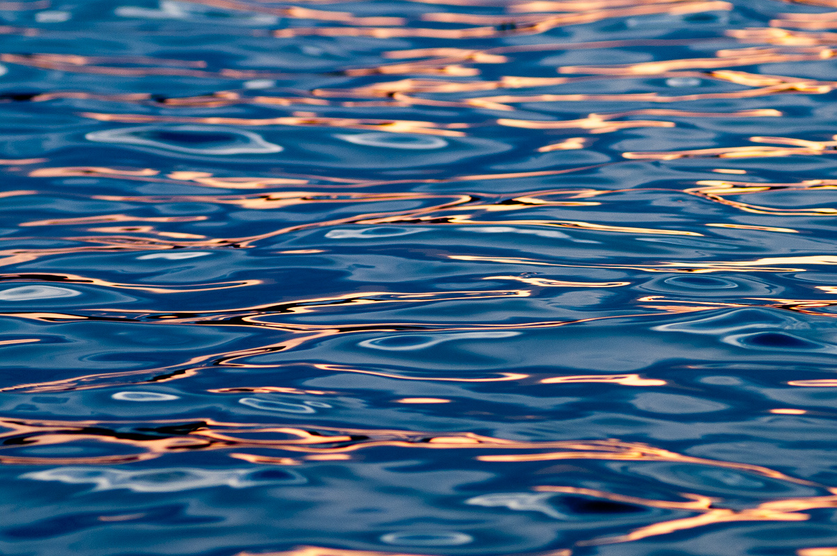Zachód słońca nad wodą, fotografia Paweł Litwin